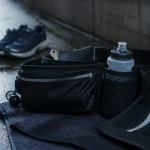 Accessoires course à pied : ceinture et soft flask pour hydratation, visibilité
