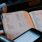 carnet d entrainement musculation papier avec chiffres, charges et reps